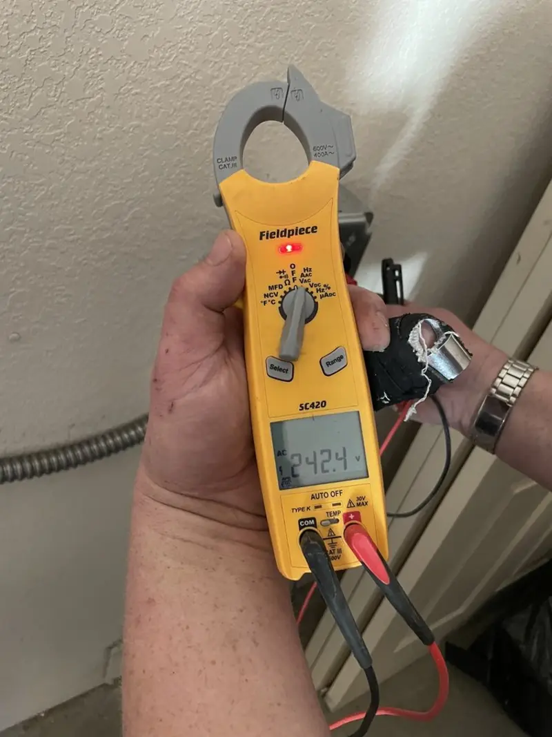 Voltage testing with clamp meter during Whole House Surge Protector in Port Neches